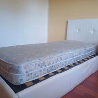 Letto bianco singolo con contenitore e materasso