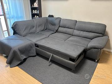 Divano letto con penisola e contenitore