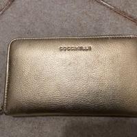 Coccinelle portafoglio con zip in pelle oro