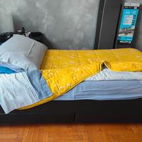 Letto in ecopelle con cassetti e doghe