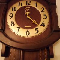 orologio da parete con pendolo 