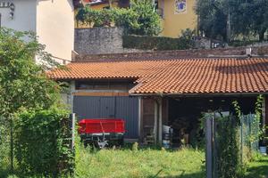 Locale box/magazzino con giardino privato