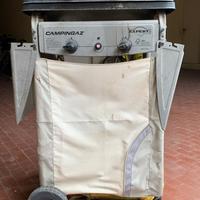 Barbecue bruciatore a gas e pietre ollari