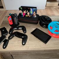 Nintendo Switch 1 con diversi accessori