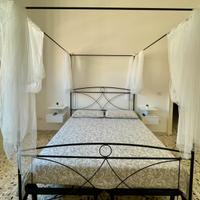 Letto a baldacchino