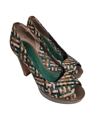 Scarpe pelle intrecciata