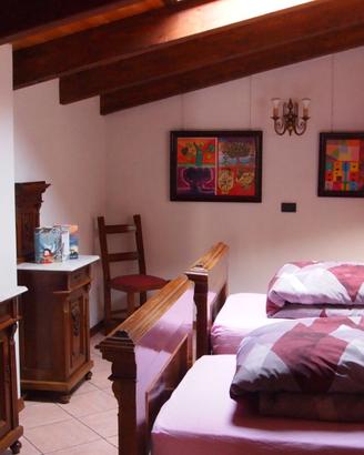 camera da letto con due letti singoli