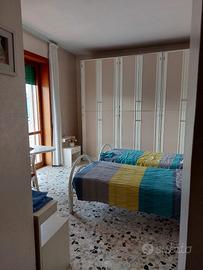 Camera con due singoli e bagno