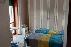 Camera con due singoli e bagno