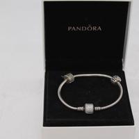 Bracciale Pandora charme tre chiusure