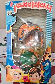 bambola con scatola Fiba 