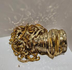 Bobina di filo con paiette dorate, ideale per deco