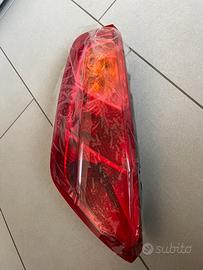 Faro posteriore sx grande punto