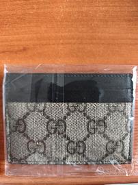 Portafoglio Gucci Supreme in Pelle