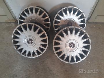 4 cerchi auto + copricerchi