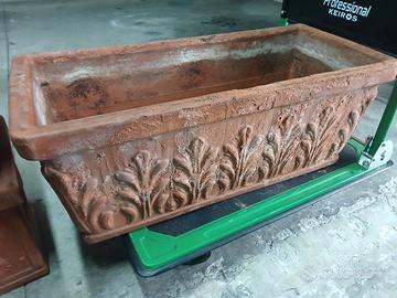 vaso terracotta con foglie 