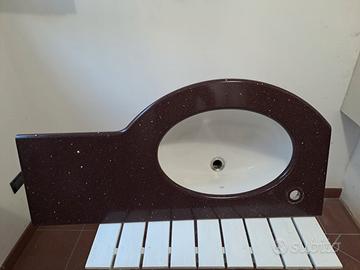 Lavandino bagno con piano in marmo tecnico