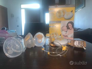 Tiralatte Medela  + sacche per conservazione latte
