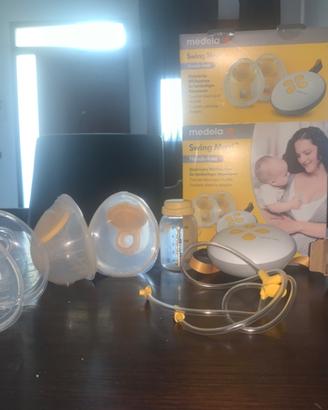 Tiralatte Medela  + sacche per conservazione latte