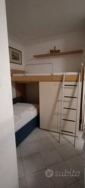 Letto a castello con armadio incorporato