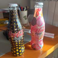Bottiglie coca cola fendi e blumarine