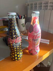 Bottiglie coca cola fendi e blumarine