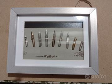 QUADRO CON PENNINI ANTICHI