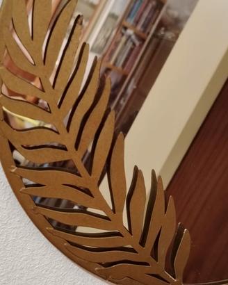 Specchio rotondo design con foglia in metallo 