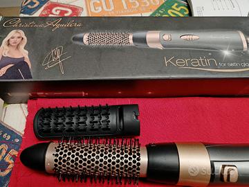 arricciacapelli con spazzola piatta