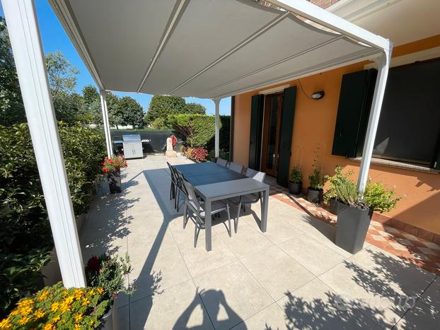 Appartamento con giardino privato ed arredato