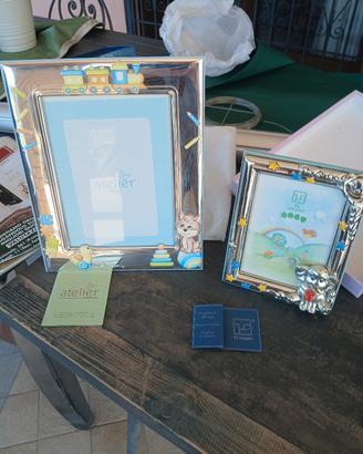 2 cornici in argento certificato una  grande e u. 