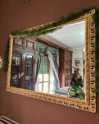 Specchio con cornice simil oro
