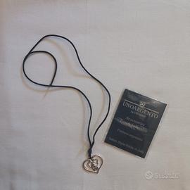 Collana ciondolo due cuori e una capanna
