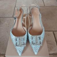 scarpe modello chanel argento