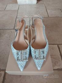 scarpe modello chanel argento