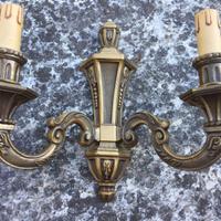 Coppia di applique in ottone finemente decorate