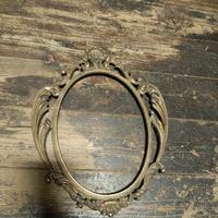 cornice ovale in ottone 
