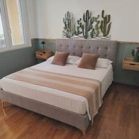 Giroletto matrimoniale in tessuto grigio