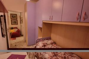 Una stanza singola e una camera matrimoniale