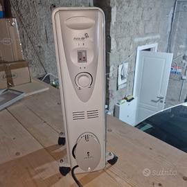 -Riscaldatore elettrico con termostato regolabile.