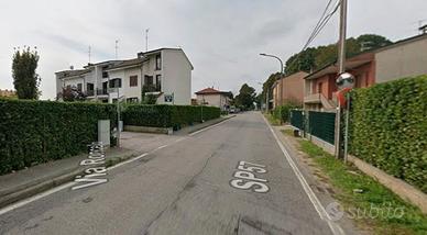 Quadrilocale con giardino privato e box auto