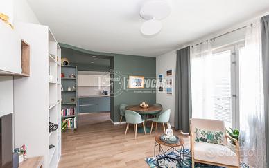 TRILOCALE CON SOLARIUM IN PALAZZINA DI RECENTE COS
