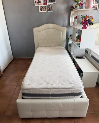 coppia letti singoli con contenitori