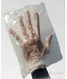 Guanti palmati trasparenti monouso (stock)