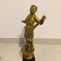 Antica statua in antimonio