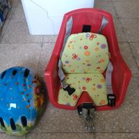 Casco bici e seggiolino da bambino