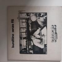 BURATTINI   SENZA  FILI  /  E.  BENNATO 