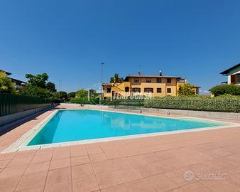 TRILOCALE CON GIARDINO, TAVERNA E BOX IN RESIDENCE