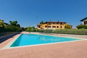 TRILOCALE CON GIARDINO, TAVERNA E BOX IN RESIDENCE