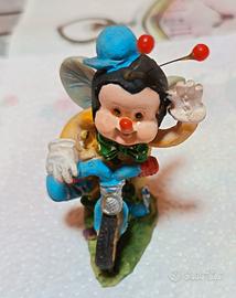 Ape clown in bici da collezione francese.